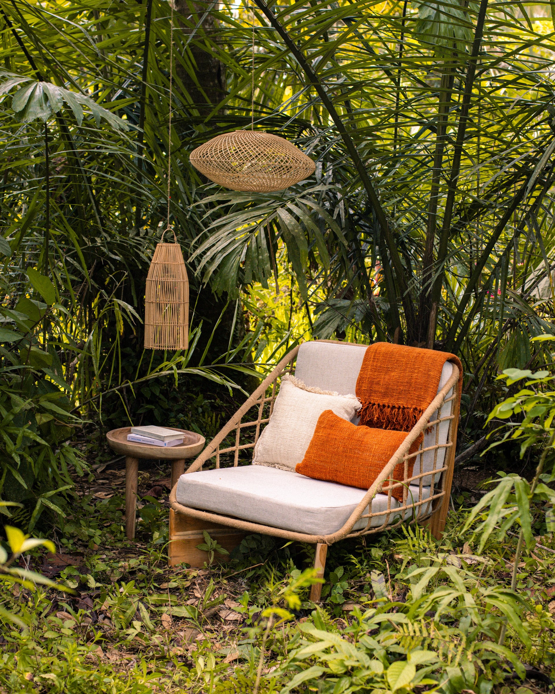 Armchair and rattan ceiling lamps in Jungle - Living room