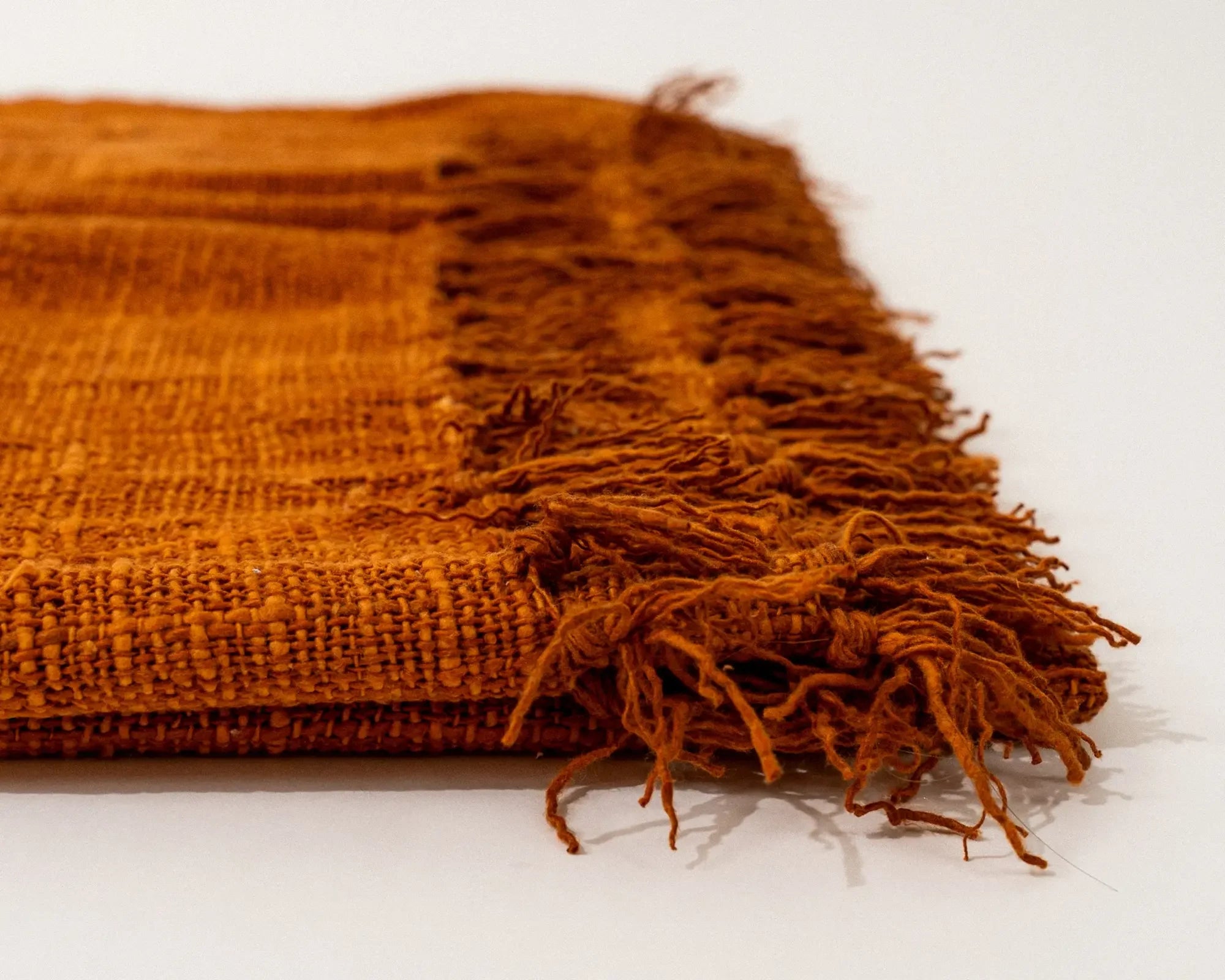 Taveuni Cotton Fringe Throw (terracotta)